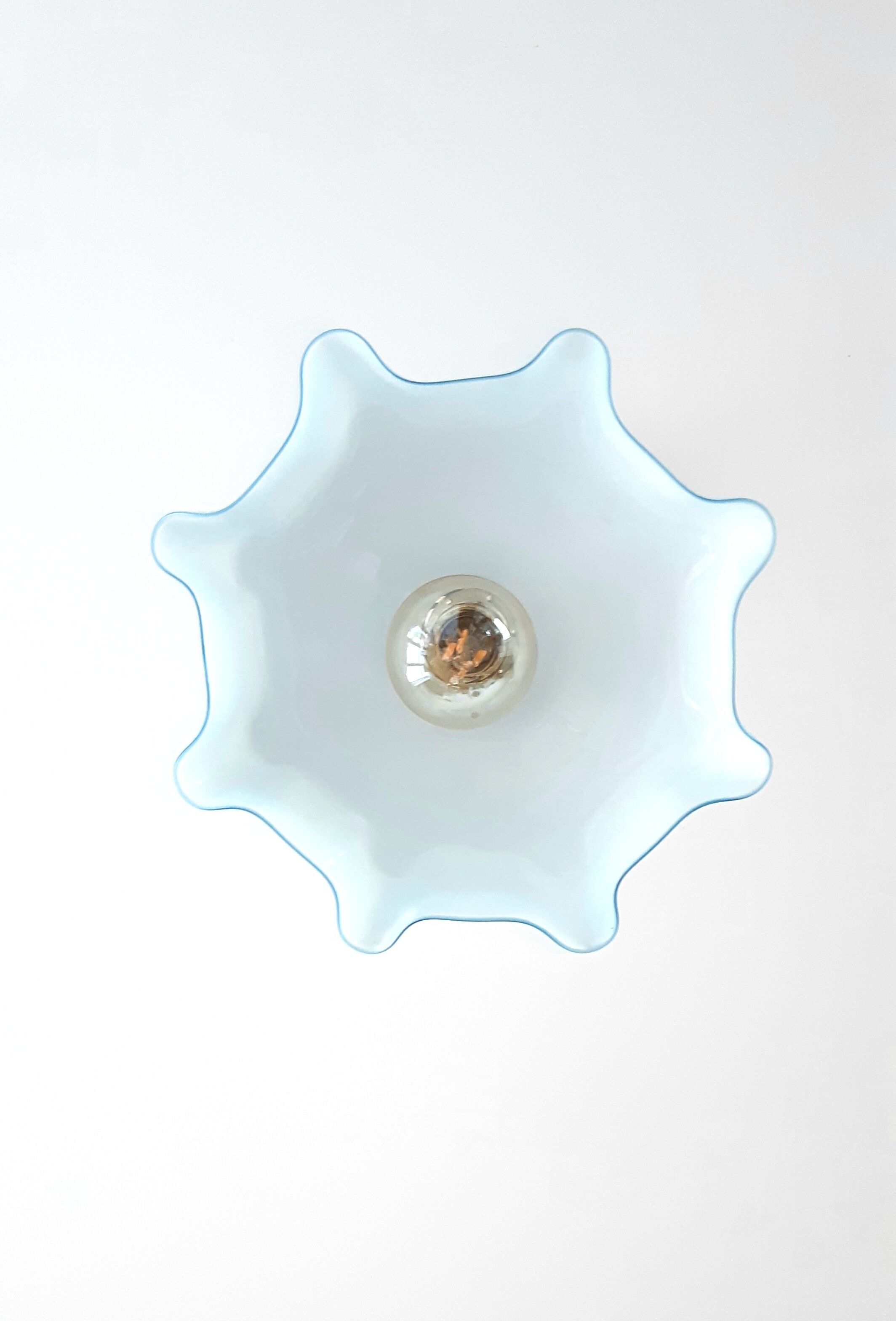 Blue opaline suspension