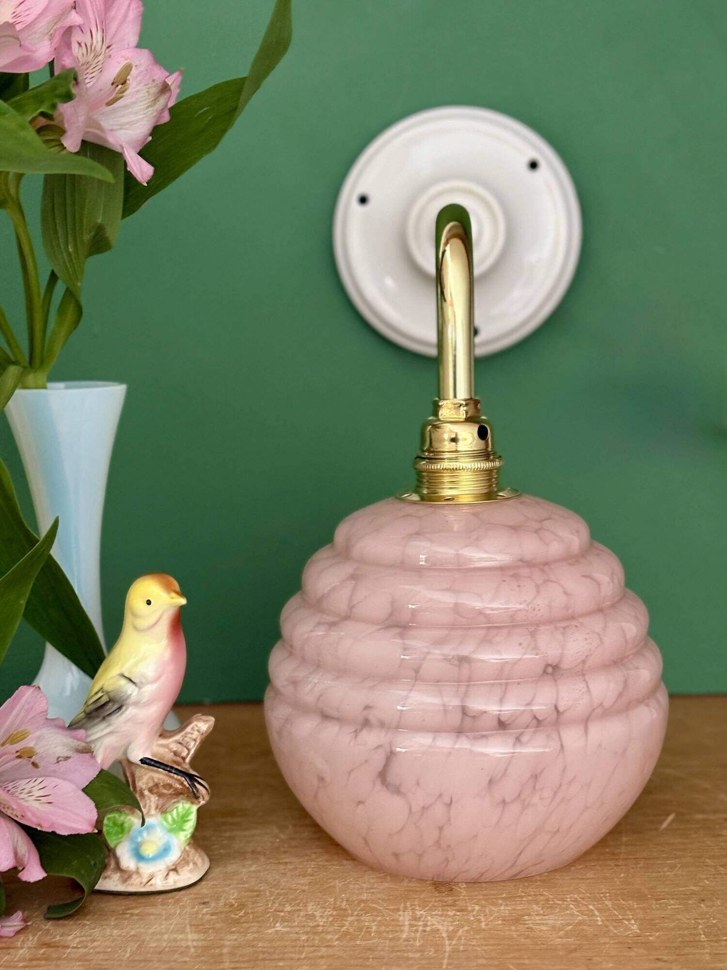 Vintage pink Clichy glass globe wall light.