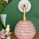 Vintage pink Clichy glass globe wall light.