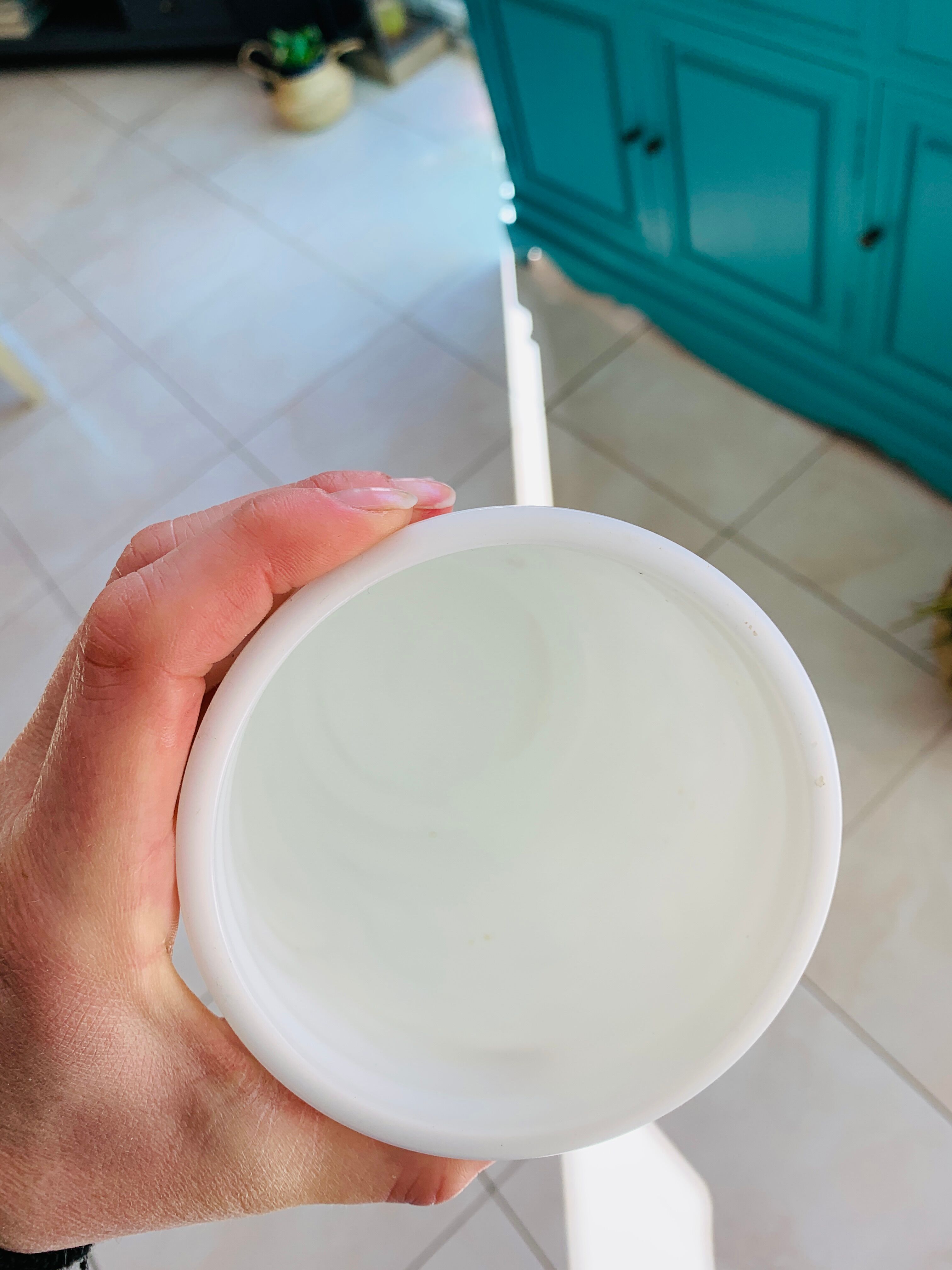 White vintage vase in opal glass