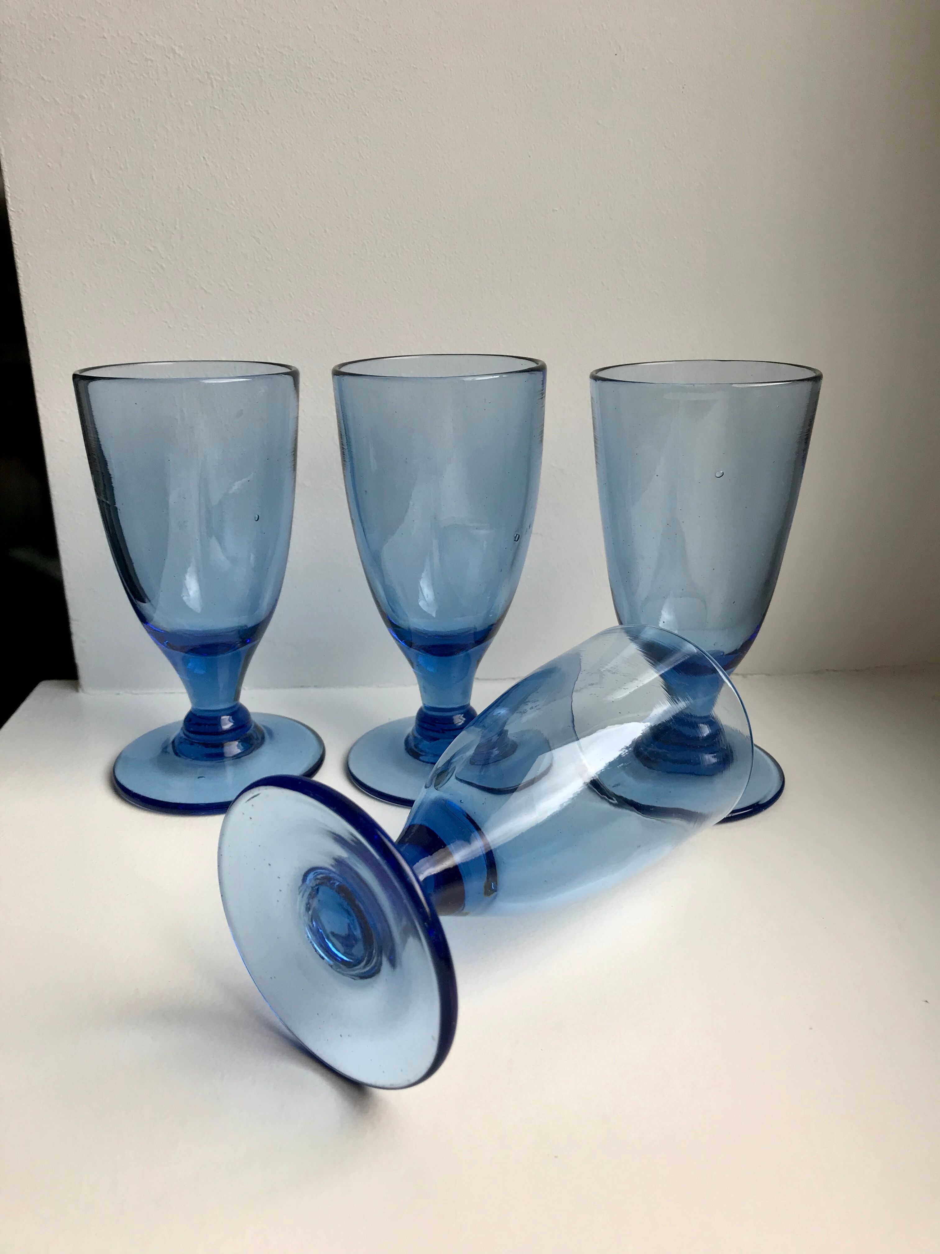Set of 4 20s blue molded glass foot glasses