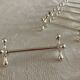 12 knife holders with metal bead decoration