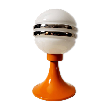 Orange metal and glass table lamp, circa 1960.