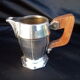 Coffee service, art tea in art deco silver metal