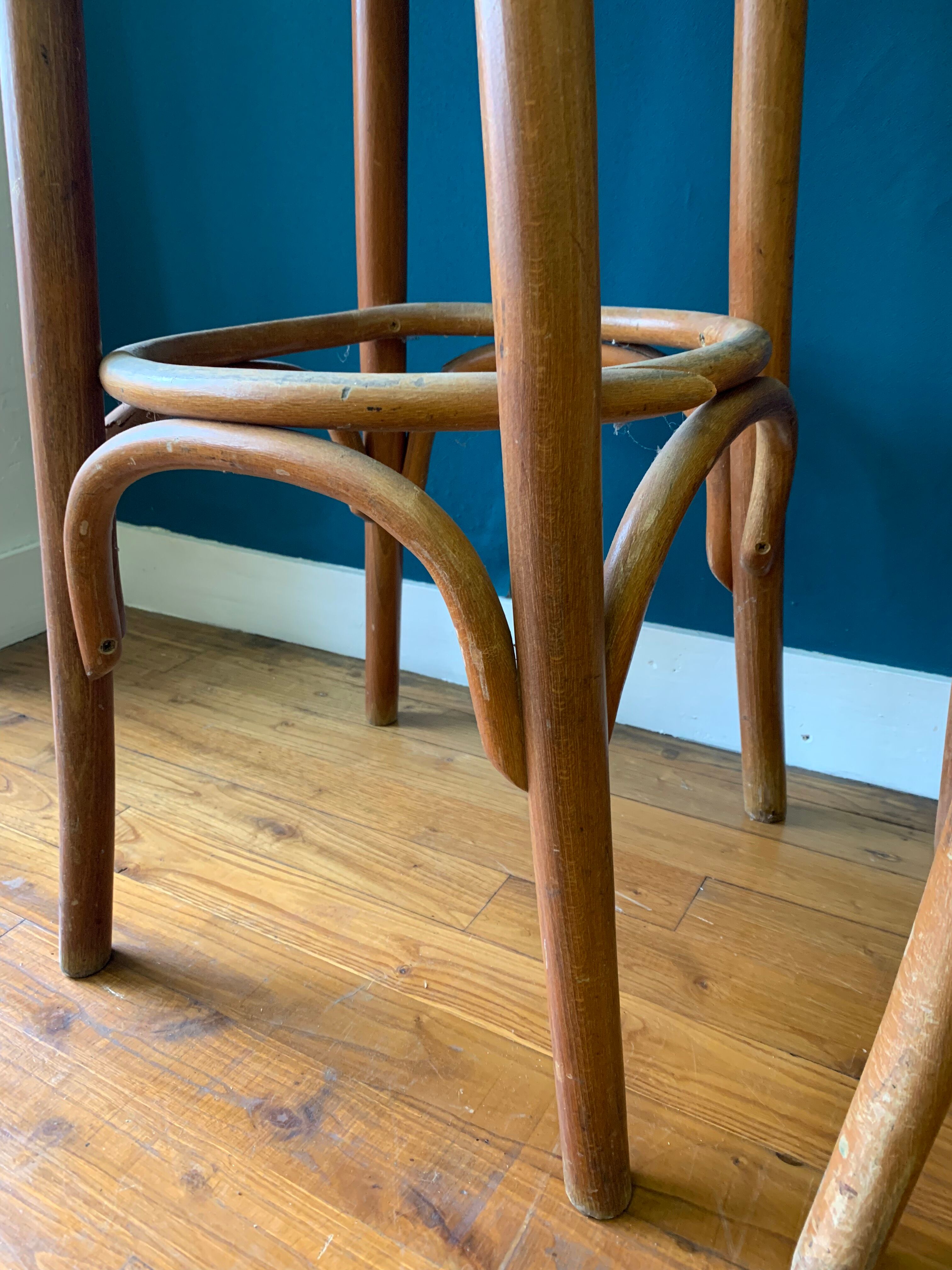 Pair of curved wooden bar stools