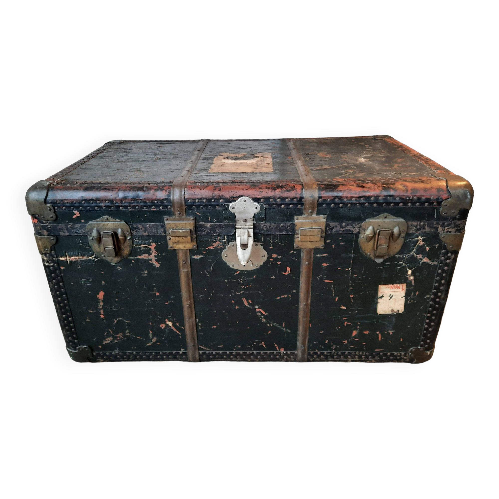 Old and large travel trunk, brass-plated corners