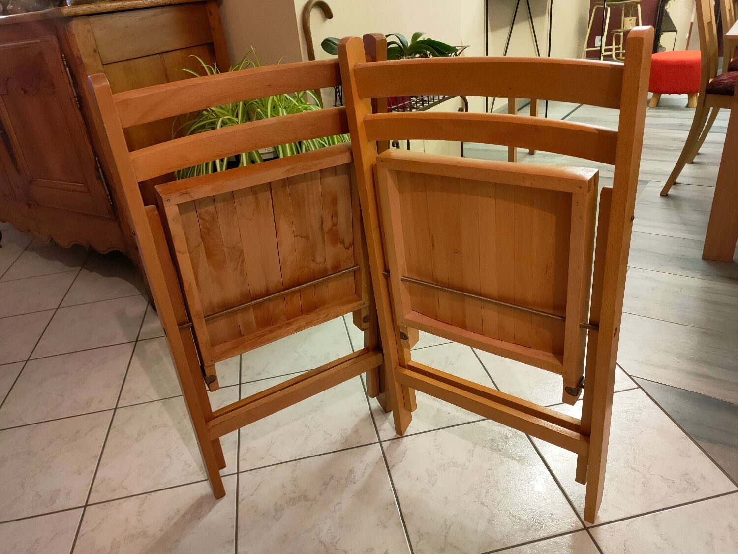 Pair of vintage folding wooden chairs