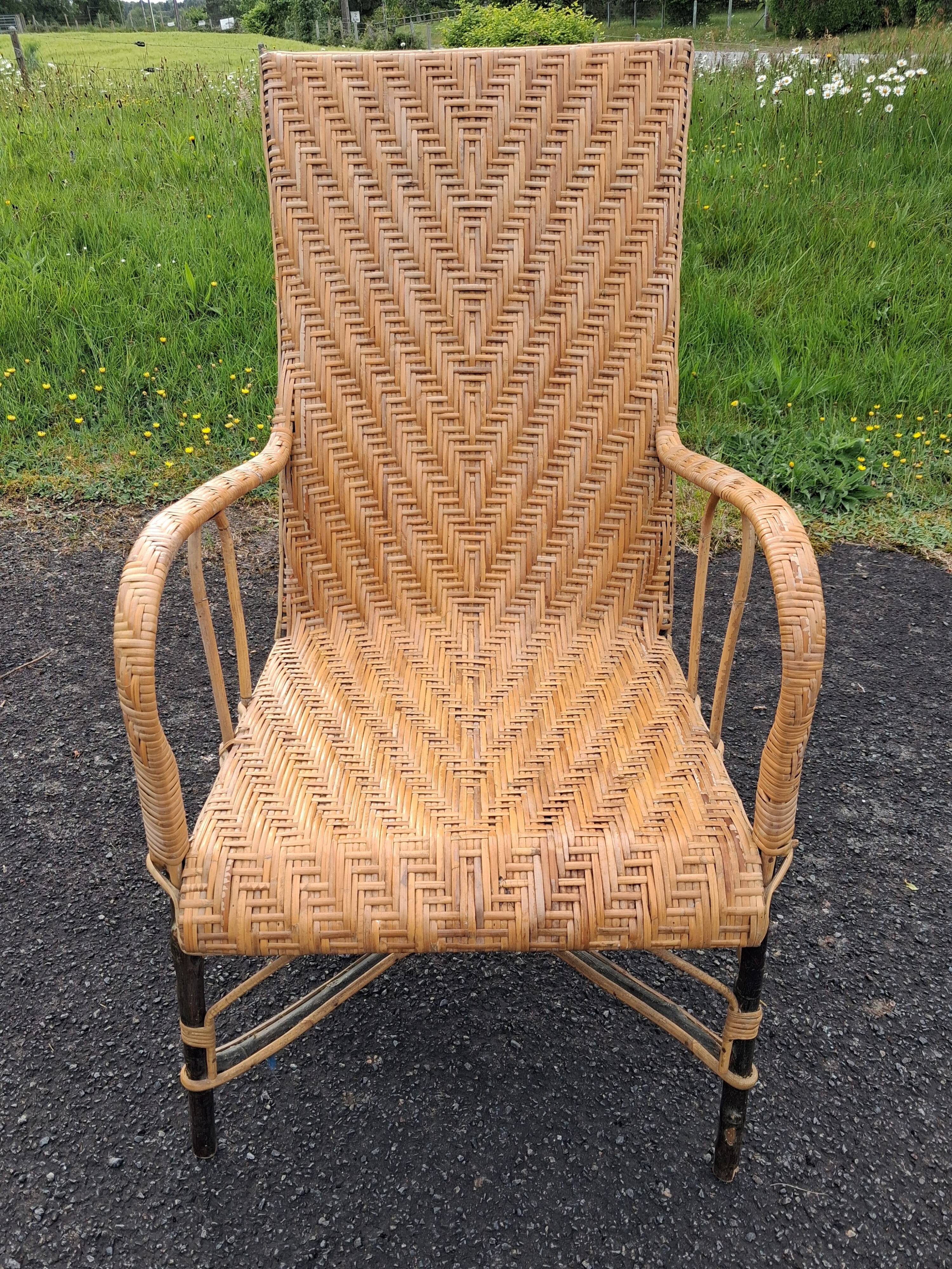 Antique high-back rattan armchair