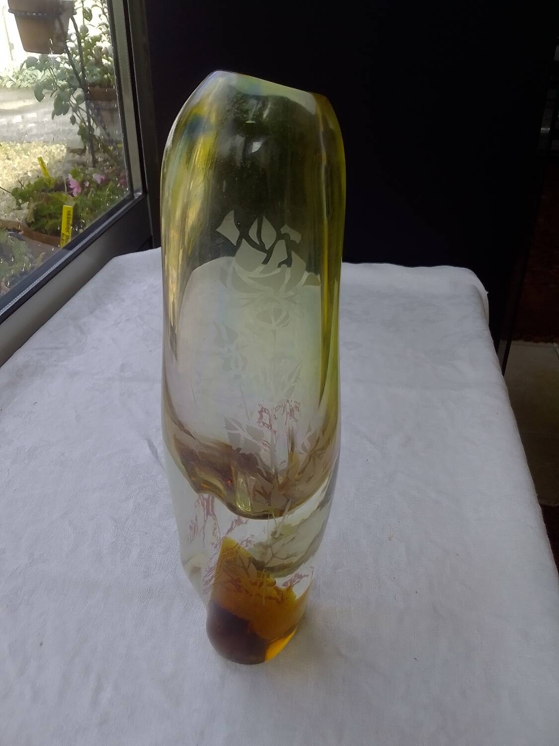 Amber-colored engraved crystal vase