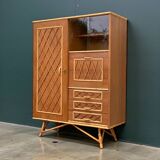 Rattan wardrobe with tapered legs from the 1960s.