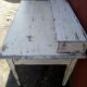 Large wooden desk with patinated bleacher
