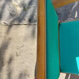 3 vintage bridge chairs with rounded armrests.