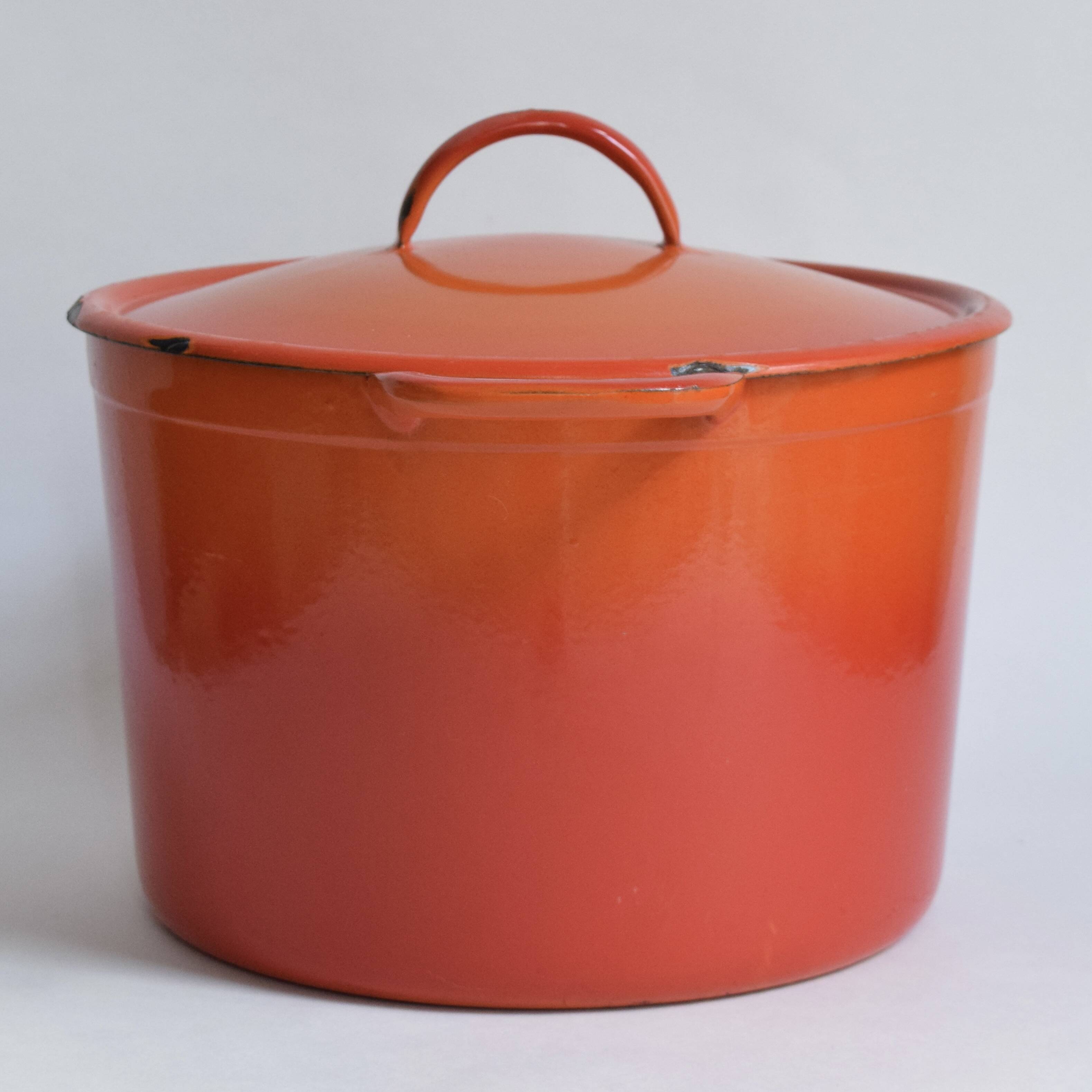 Large vintage saucepan or casserole dish in orange enameled cast iron