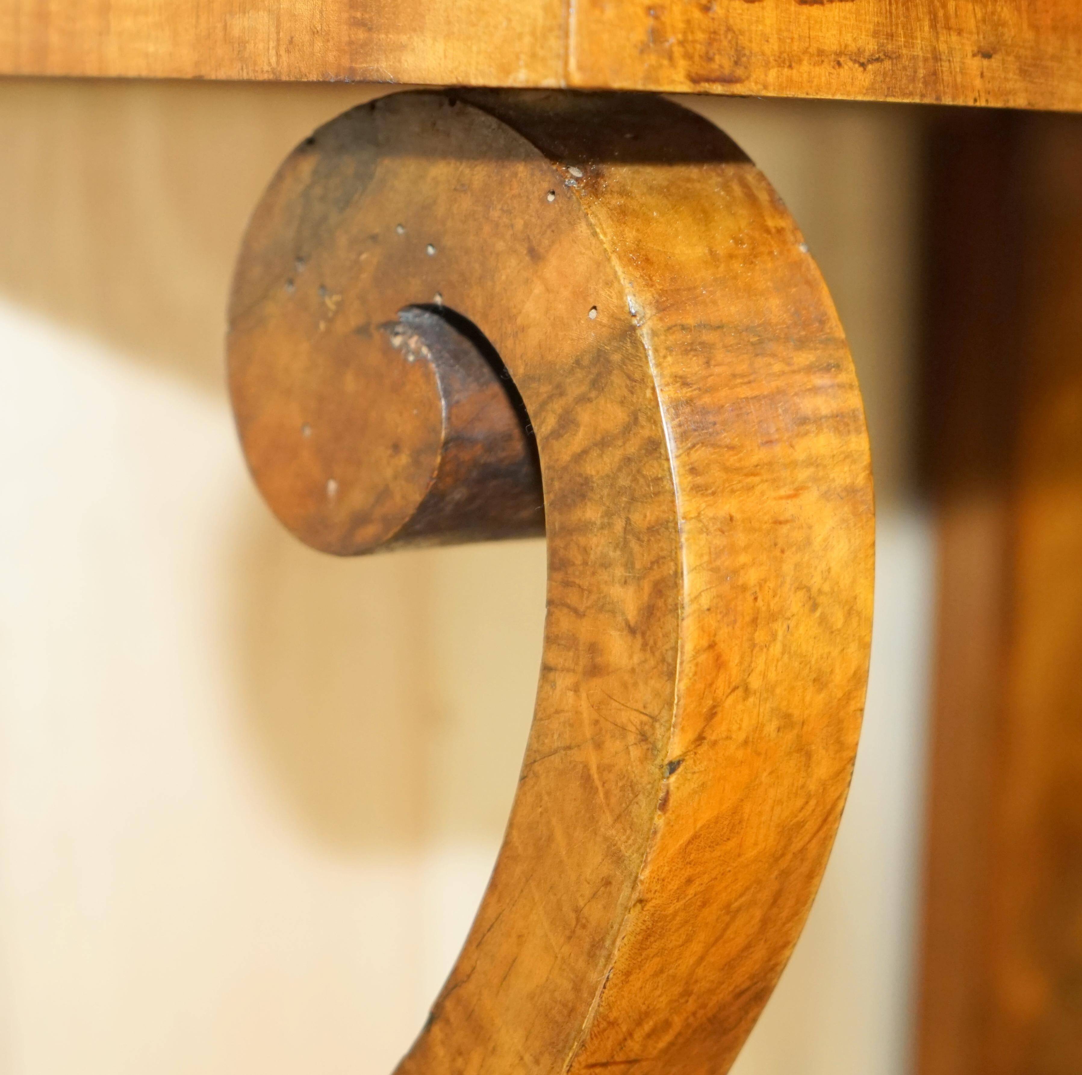 Pair of restored antique consoles from around 1815 in walnut, Regency style with mirror.