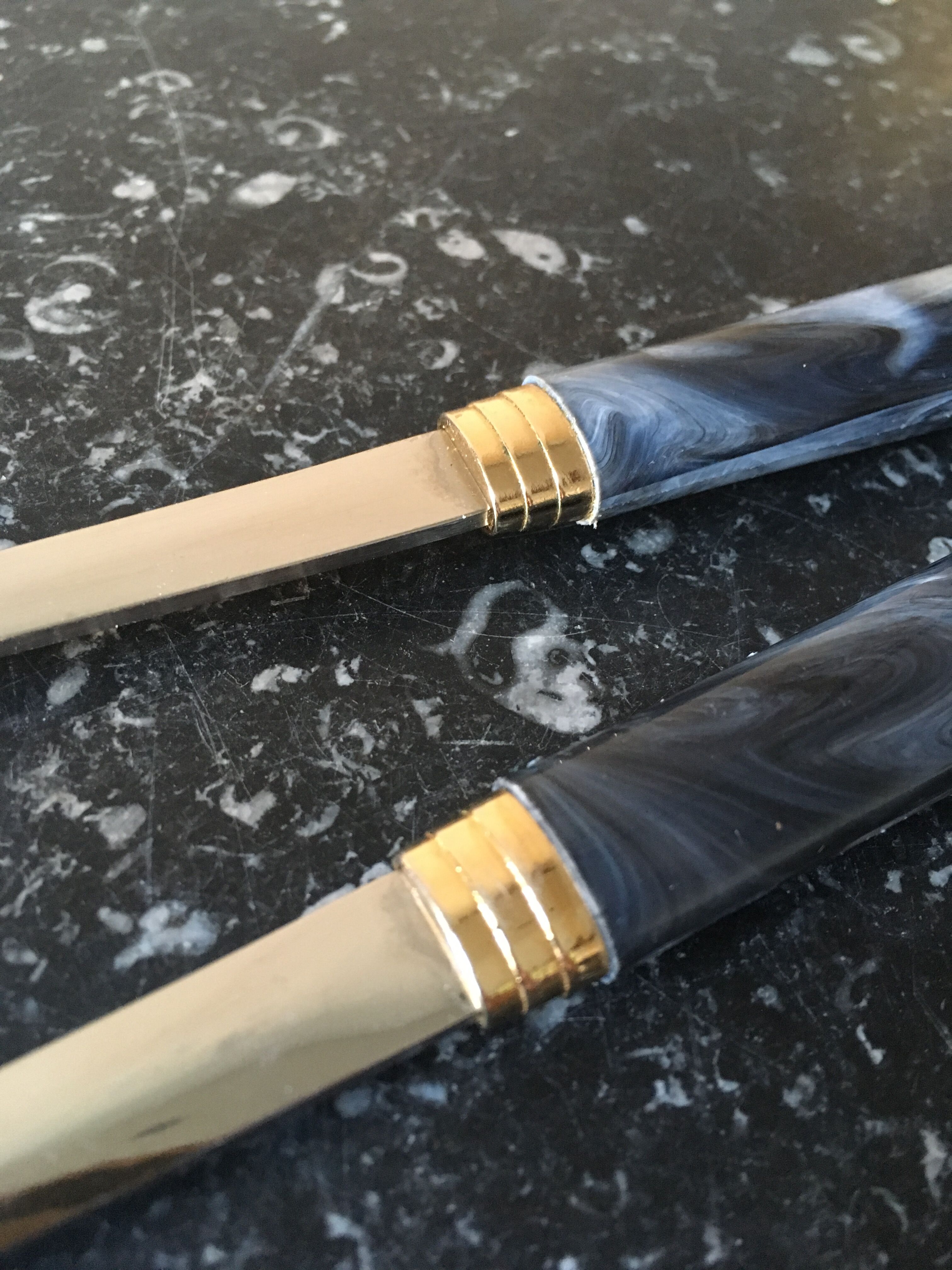 Guy Degrenne salad cutlery in stainless steel and bakelite