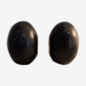 Pair of greenhouse books in black marble in the shape of an egg.