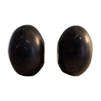 Pair of greenhouse books in black marble in the shape of an egg.