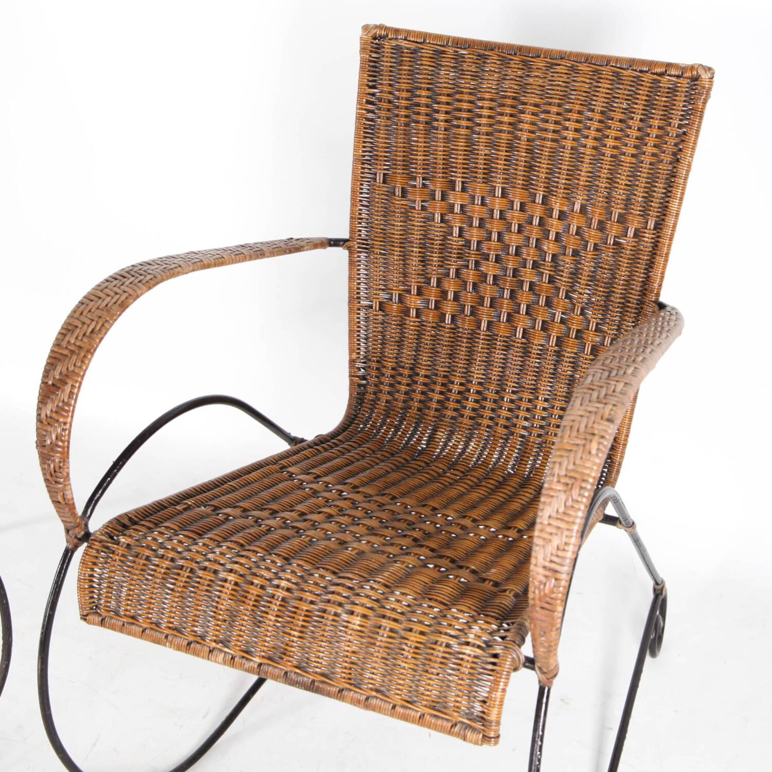 Pair of rattan and iron armchairs