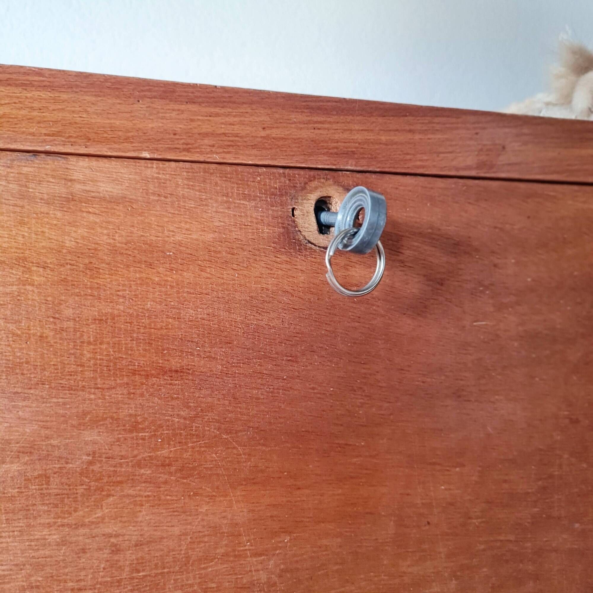 Vintage 1950s wooden secretary with tapered legs and mint interior.