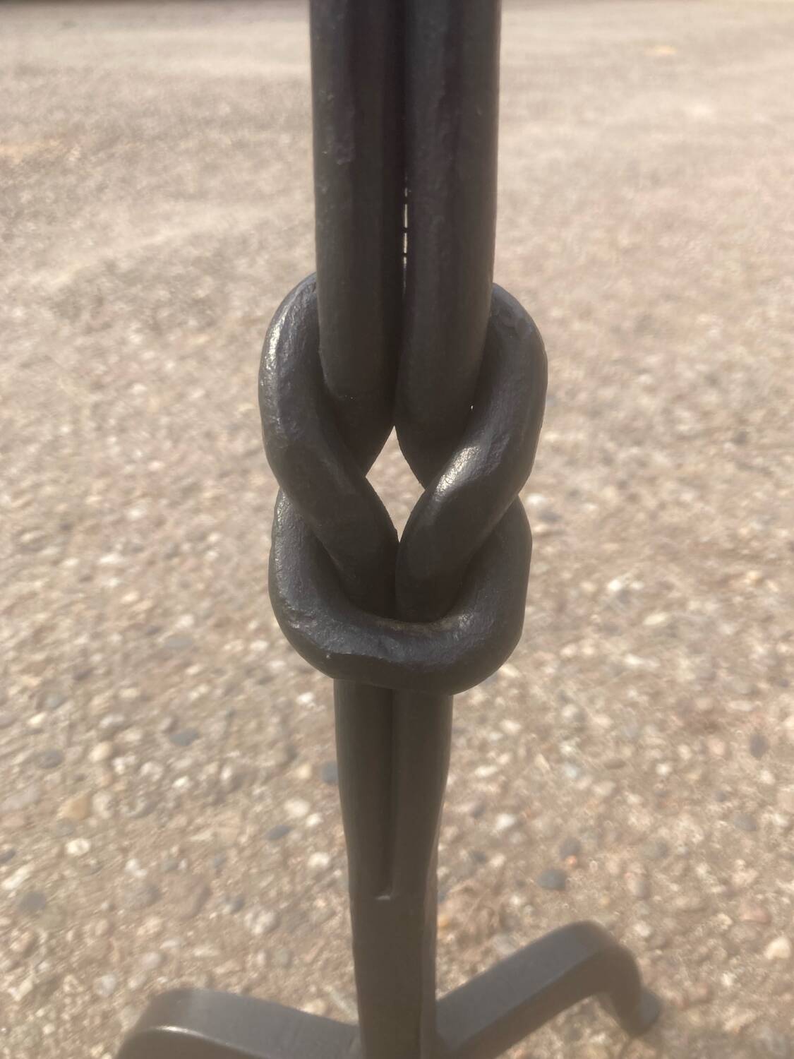 Pair of wrought iron candlesticks