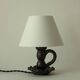 Lampe en céramique noire formant bougeoir