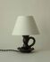 Lampe en céramique noire formant bougeoir