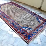 Spectaculaire tapis persan noué à la main 245x137cm