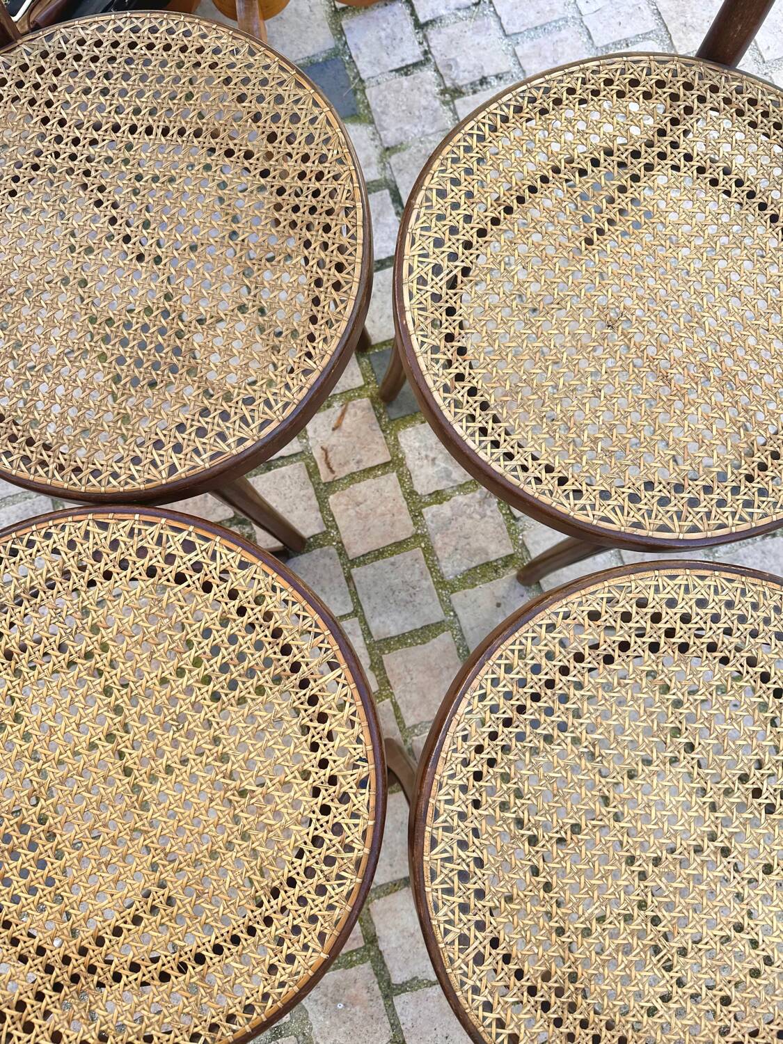 Wooden and cane bistro chairs