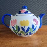 Antique teapot with flower pattern