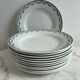 Set of 12 flat plates in Saint Amand earthenware, 22.5cm.