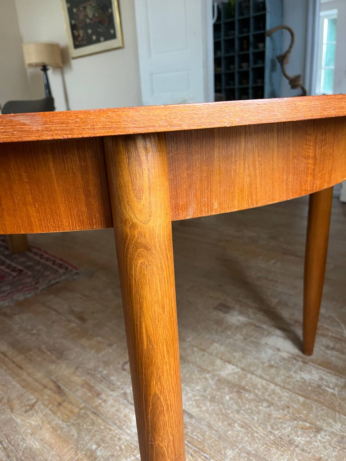 Scandinavian round teak table with butterfly extensions from the 60s