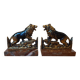 Small roaring lion bookends in patinated metal on a marble base.