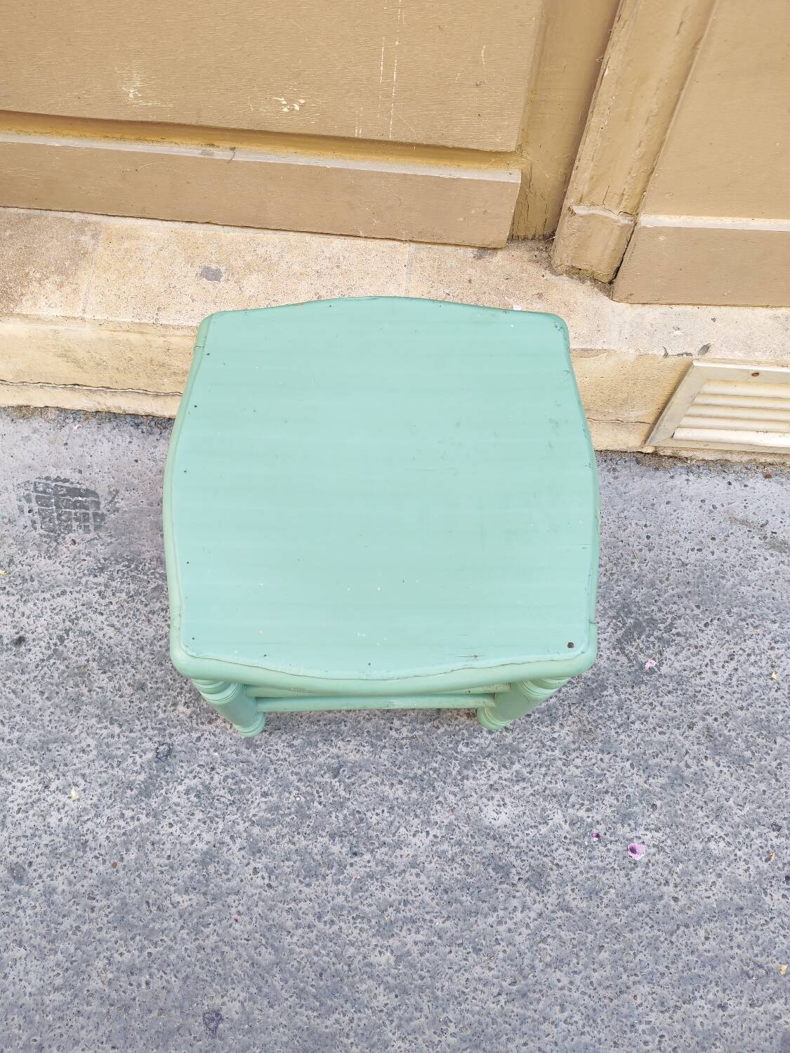Antique green stool