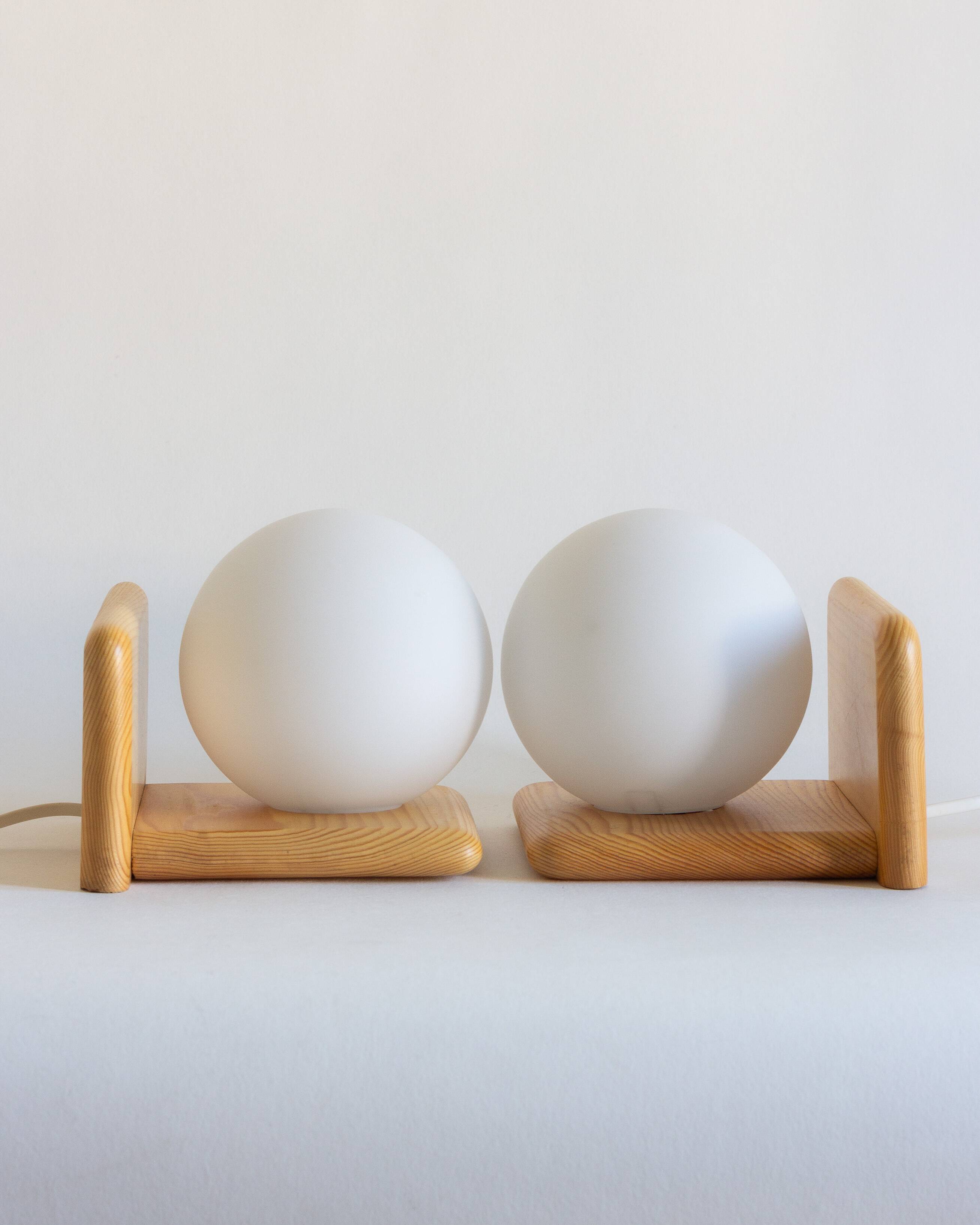 Duo of pine and opaline glass wall lights, 1980s