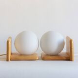 Duo of pine and opaline glass wall lights, 1980s