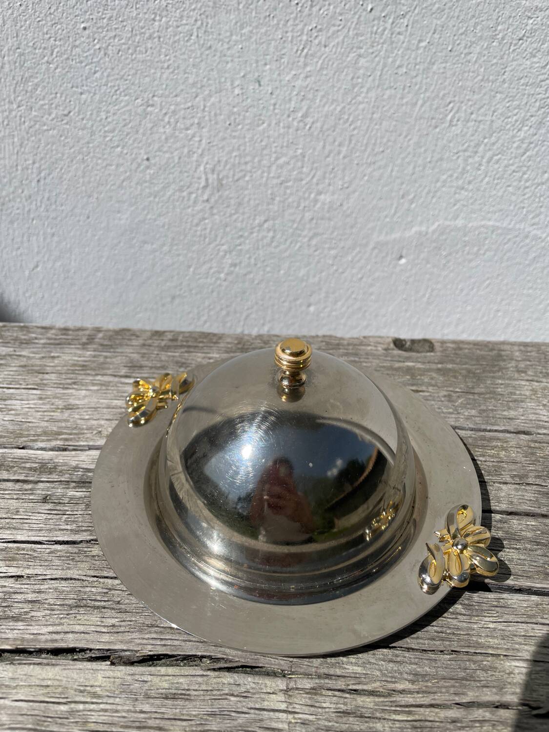 Silver-plated metal butter dish with knots