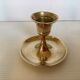 Trio of brass candle holders