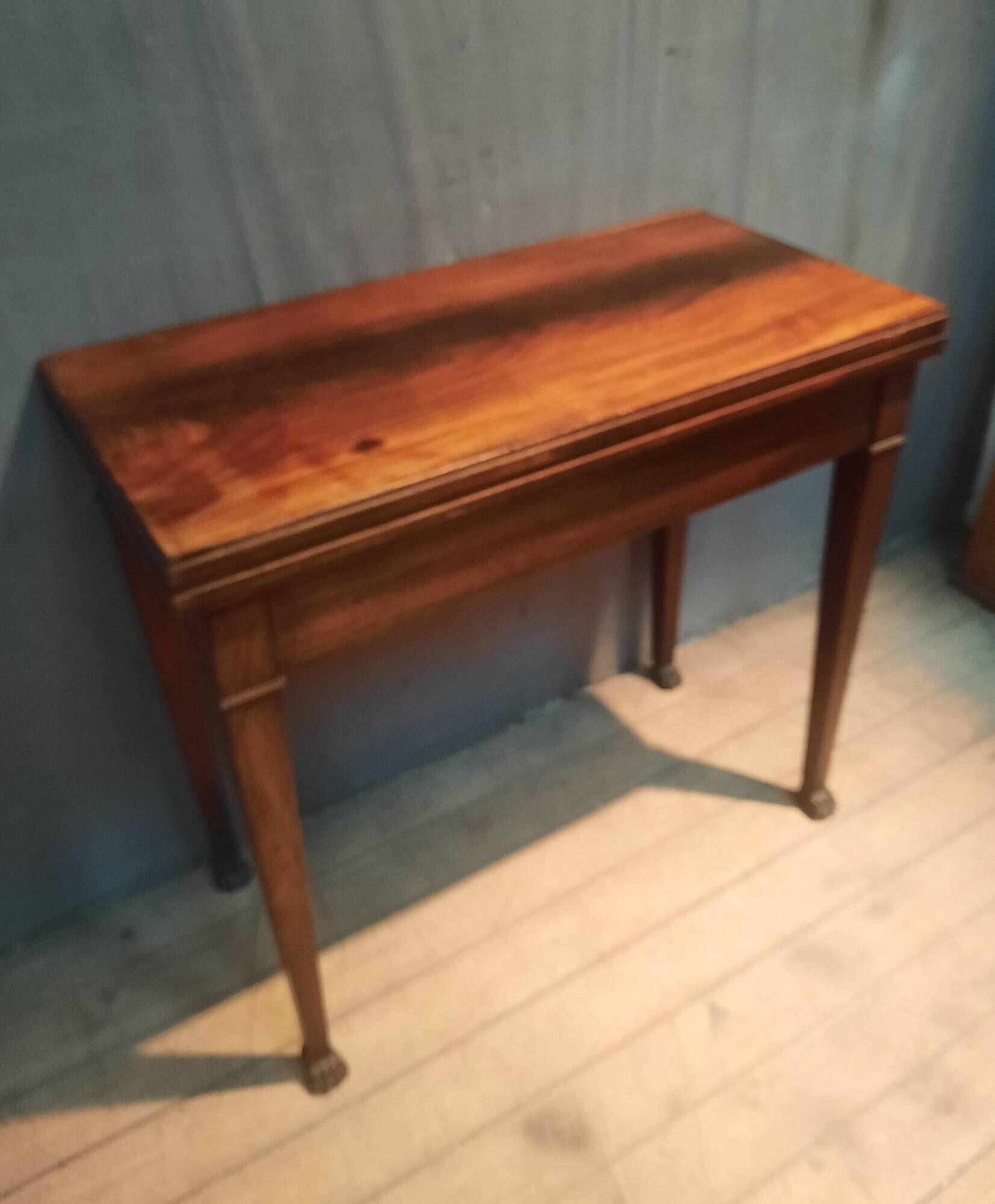 Rectangular console that transforms into a game table.
