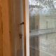 Window with interior shutters