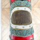 Large decorative rocking horse made of carved and hand-painted wood.