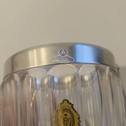 Small transparent crystal ice bucket Demeyere with stainless steel handle.