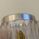 Small transparent crystal ice bucket Demeyere with stainless steel handle.