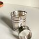 Silver-plated glass and napkin ring by UDNER