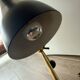 Eichholtz Cordero desk lamp in brass, black metal and marble.