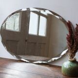 Old oval beveled art deco mirror