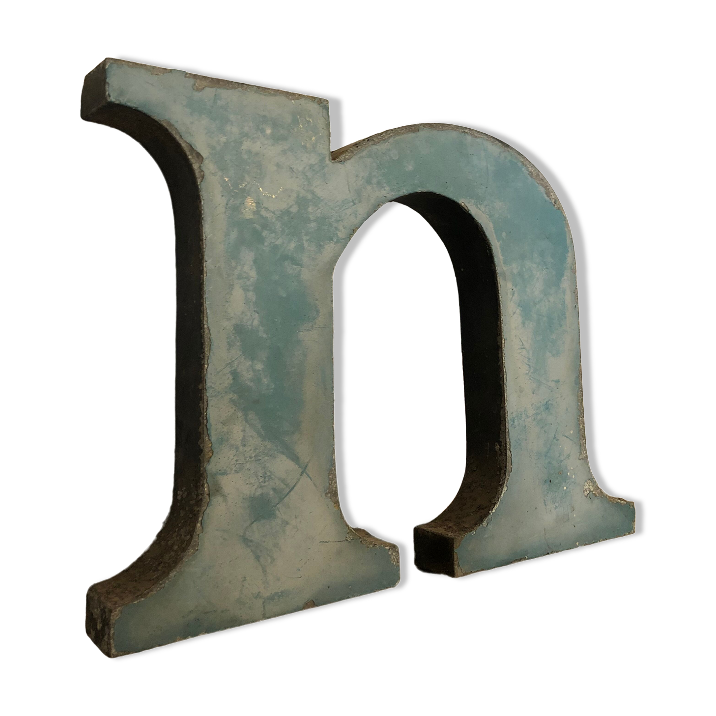 Blue metal letter "N"