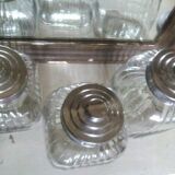 three large glass jars