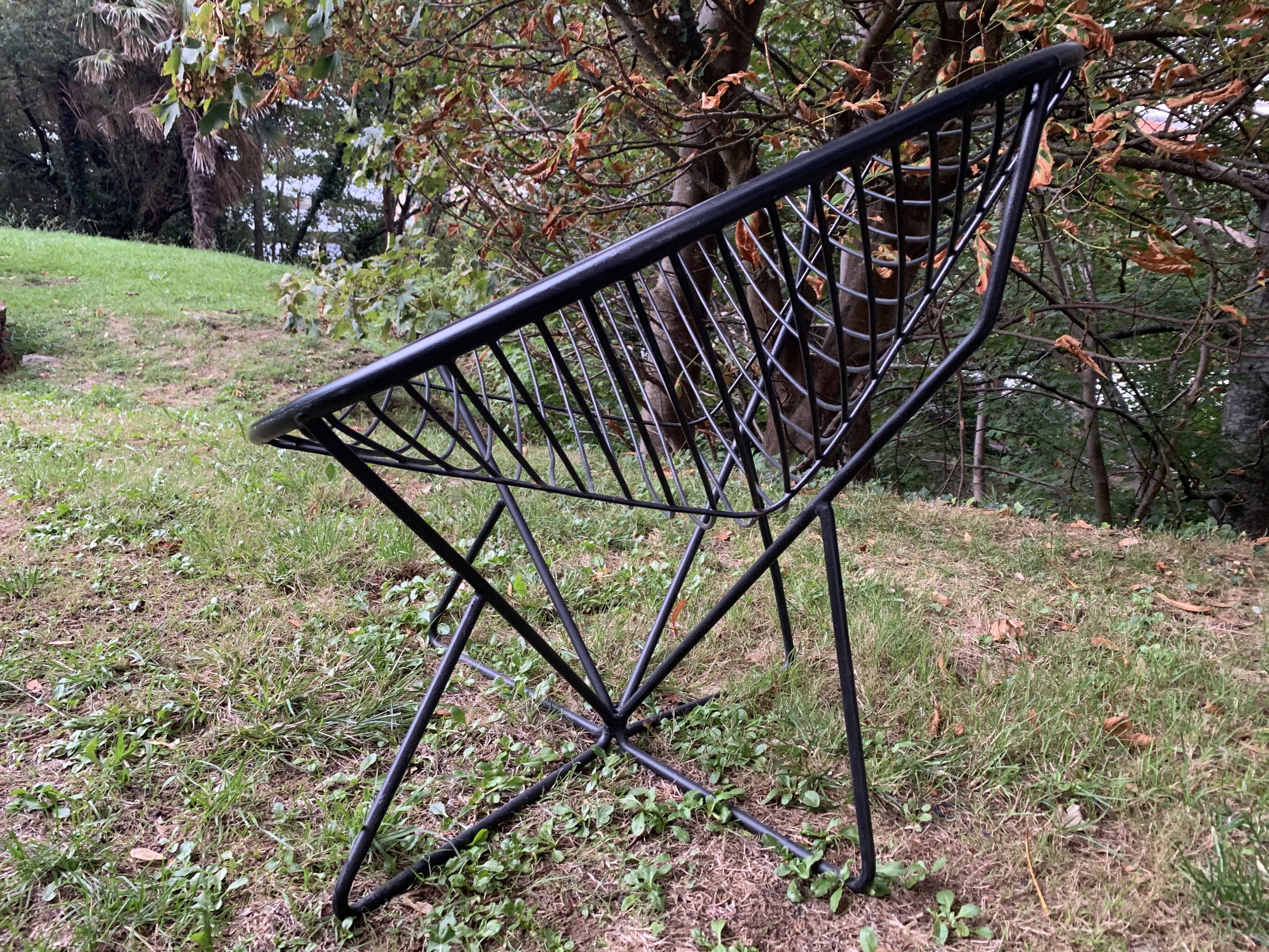 Pair of round chairs in black tubular steel 1960
