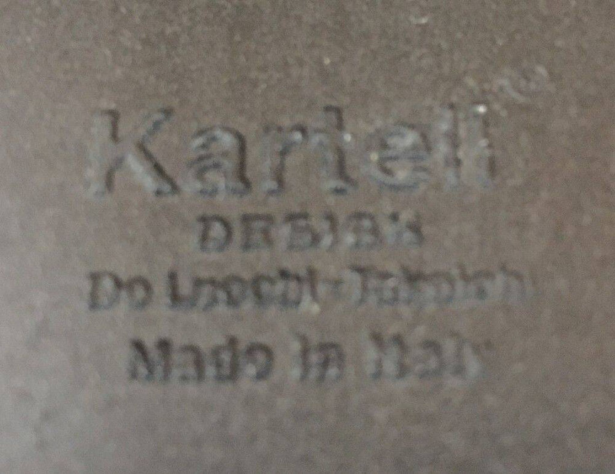 Michele De Lucchi & Tadao Takaichi for Kartell. Black plastic coat rack "Segmenti". Italy. 1989