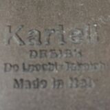 Michele De Lucchi & Tadao Takaichi for Kartell. Black plastic coat rack "Segmenti". Italy. 1989